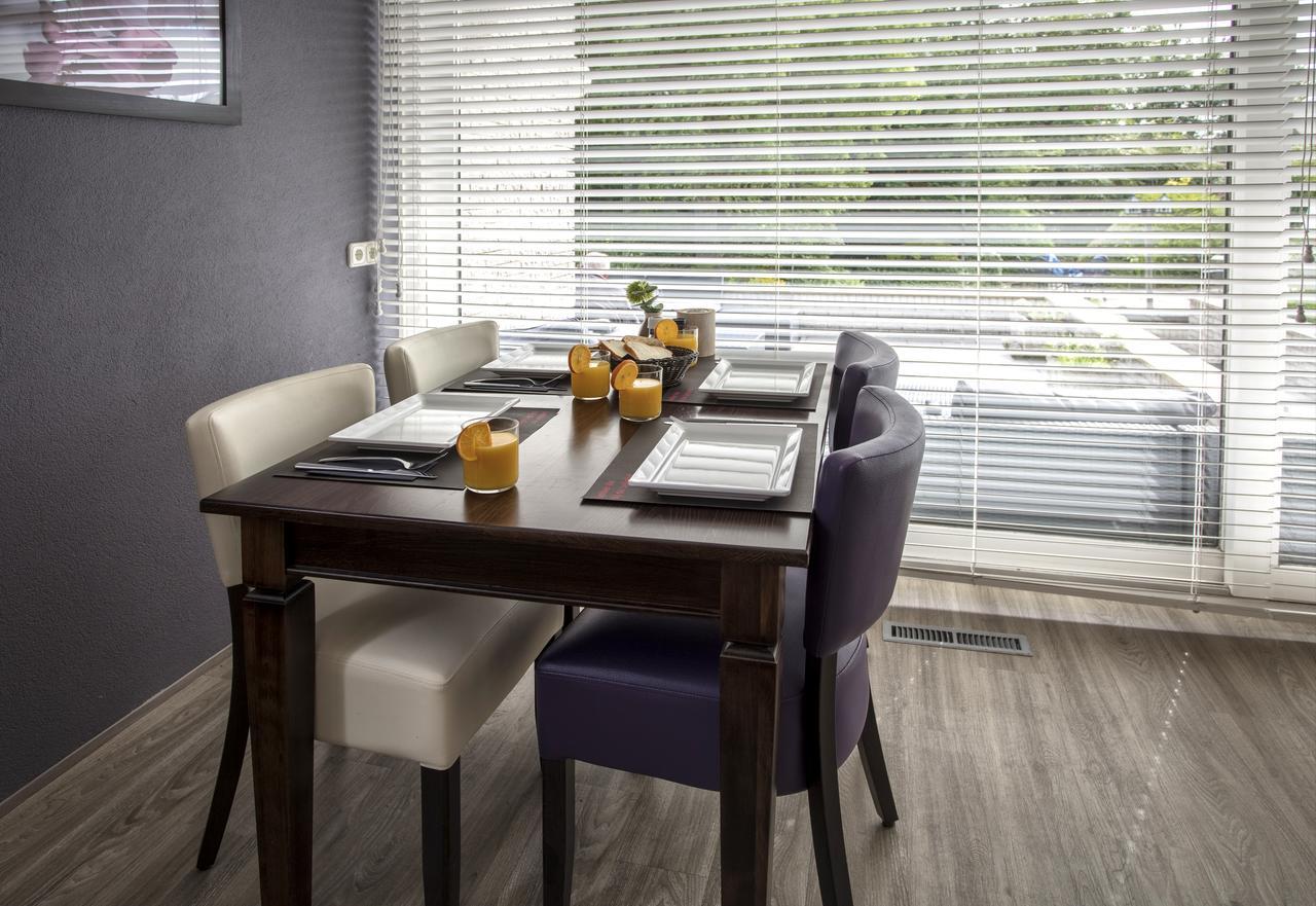 Lodgehotel De Lelie Makkum Extérieur photo